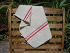 BHW Country Towel Variegated Stripes Red ist ein kleines naturfarbenes Handtuch, Geschirrtuch mit roten Streifen handgewebt in Südafrika von den Barrydale Hand Weavers.