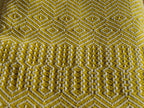Mungo Bakuba Throw Wohndecke "Turmeric"